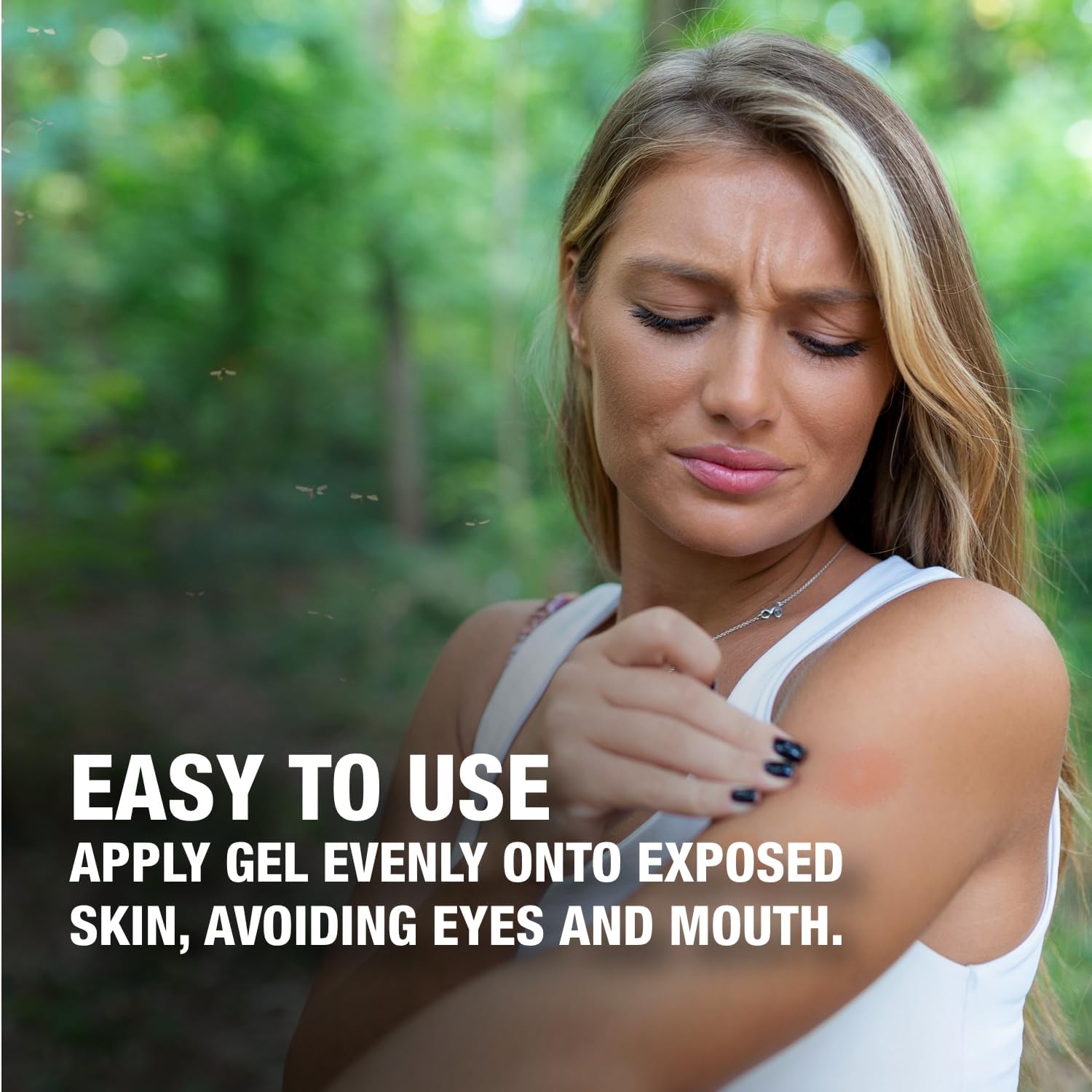 A woman applying CoreTex Anti-Itch Dual Action Gel to her arm, demonstrating ease of use.