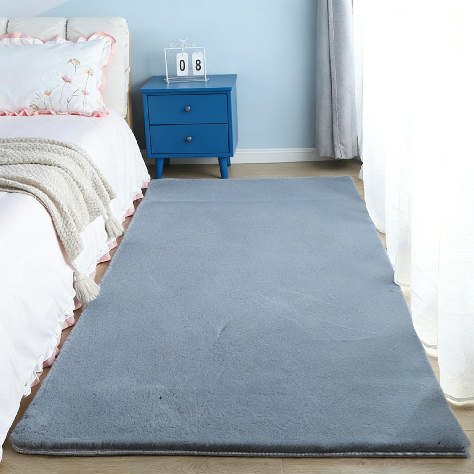 Tapis salon uni sobre anti-poussière à poils ras aspect fourrure