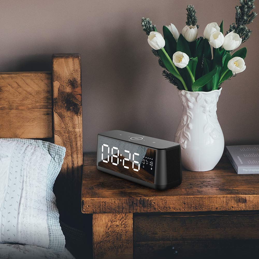 Top view of MIFA A30 speaker showing touch control panel with labels