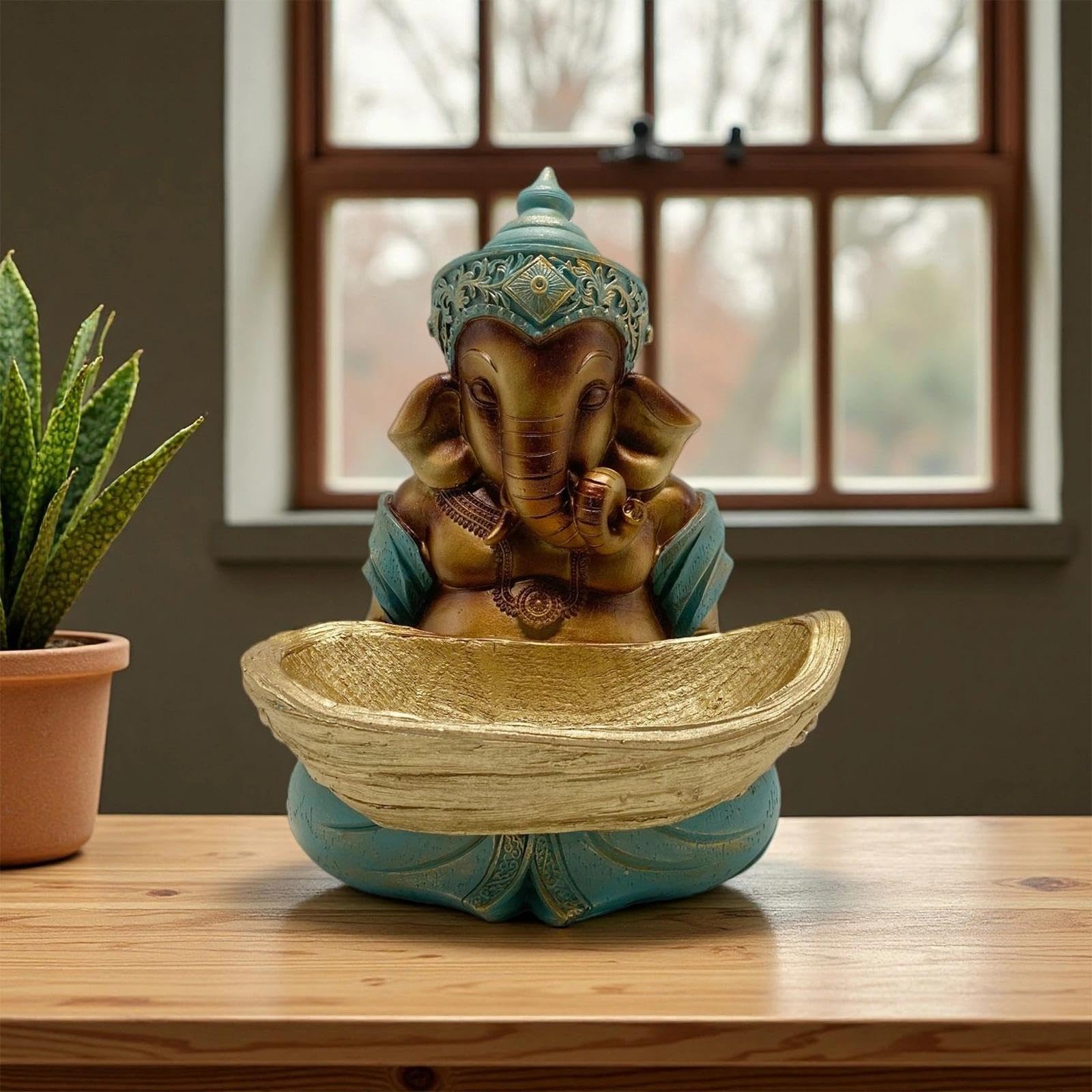 Figurka Ganesha z żywicy z świecznikiem, 32 cm, figurka religijna - ręcznie malowana indyjska dekoracja jako dekoracja stołu i medytacji, figurka boga słonia