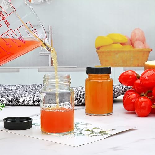 Miniatura 7 de QAPPDA Botellas de vidrio de 2 onzas, botellas pequeñas de jugo de vidrio con tapas negras para líquidos, botellas de muestra de chupito, a prueba