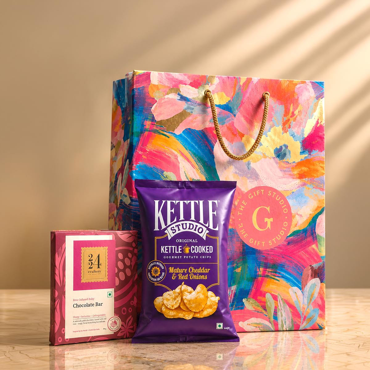 THE GIFT STUDIO.COM | Chocolate Indulgence Rakhi Gift Set | Rose Ruby Chocolate Bar, Cheddar Chips & Floral Gift Bag | Raksha Bandhan Gift-image-13