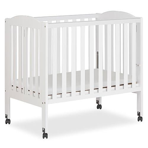 Dream On Me 2-in-1 Folding Portable Compact Mini Baby Crib in White, GreenGuard Gold & JPMA, US Patented Flat Folding System, Locking Wheels, 1″ Mattress Pad, Space-Saving Quck Fold Easy Storage