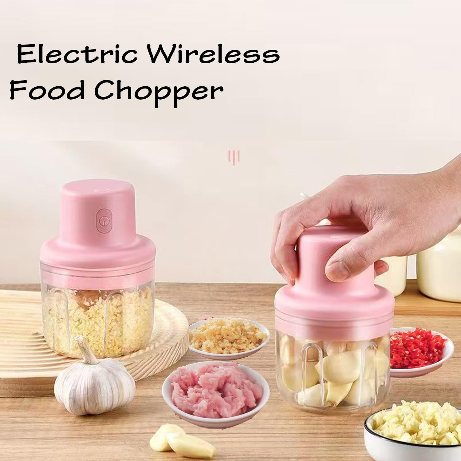Electric wireless food chopper in use, showing chopped garlic, ginger, and meat in bowls.