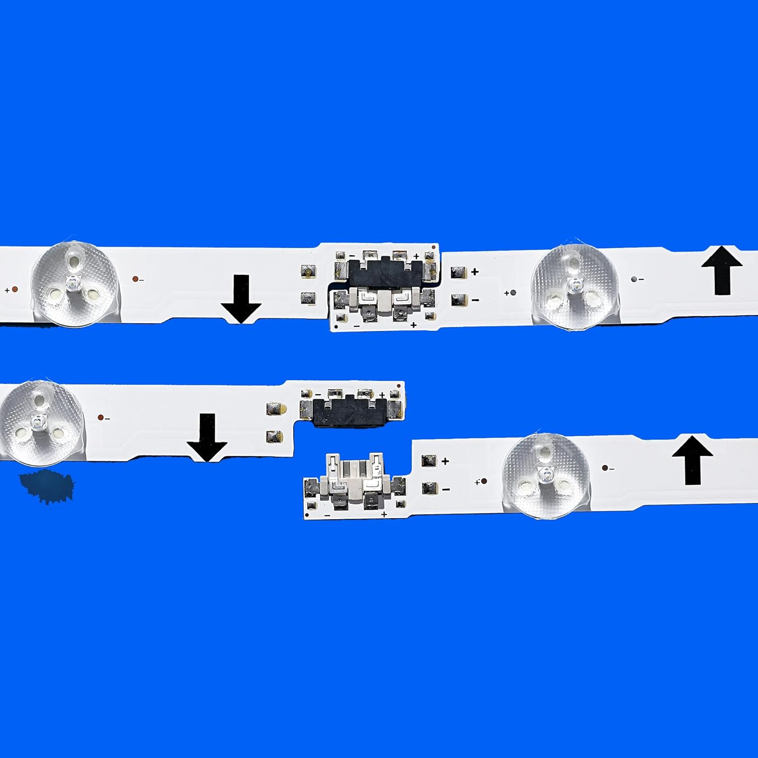 Close-up of FENSAJRD LED backlight strip connectors and part numbers