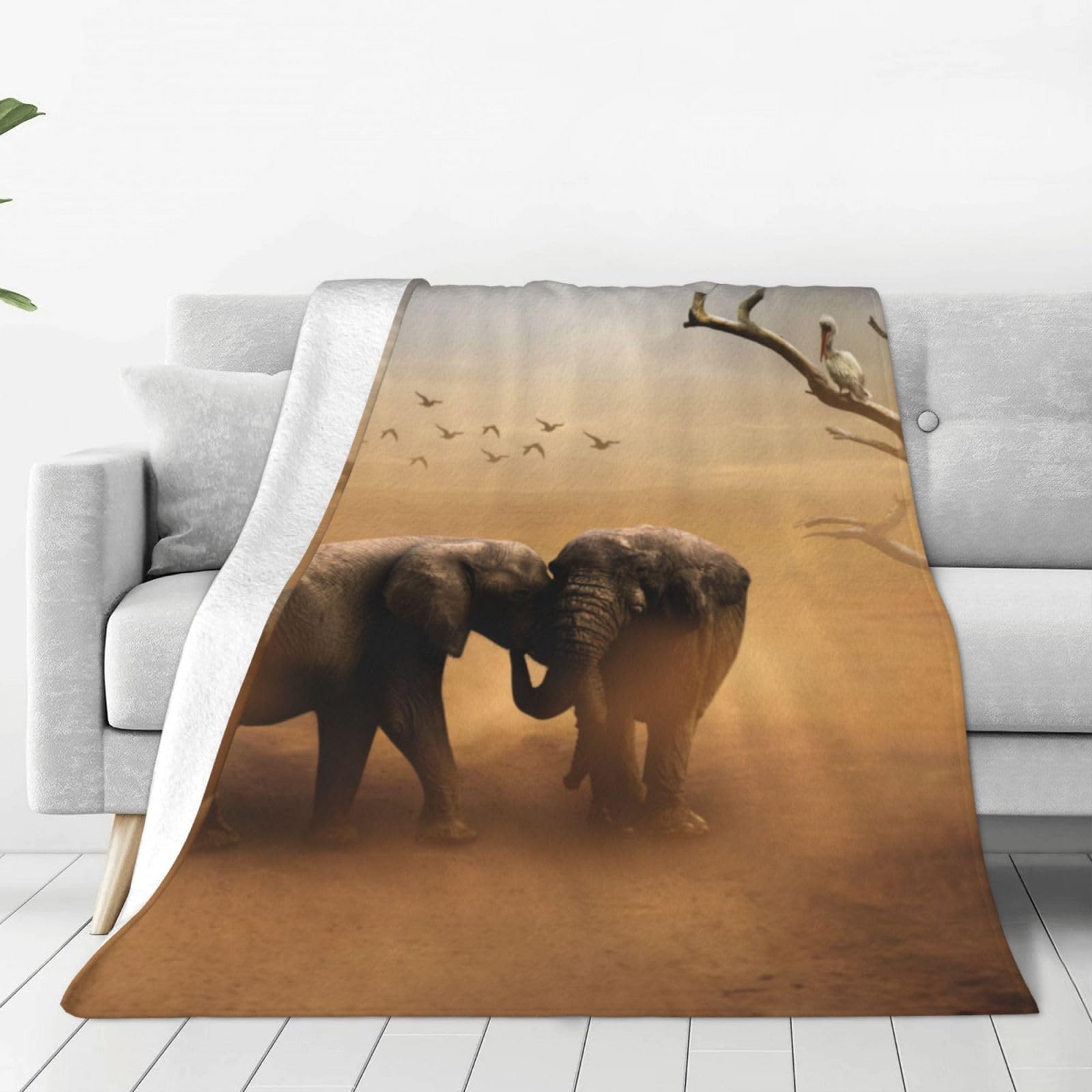 Plaid éléphants doux pour cocooning au salon et sieste au bureau
