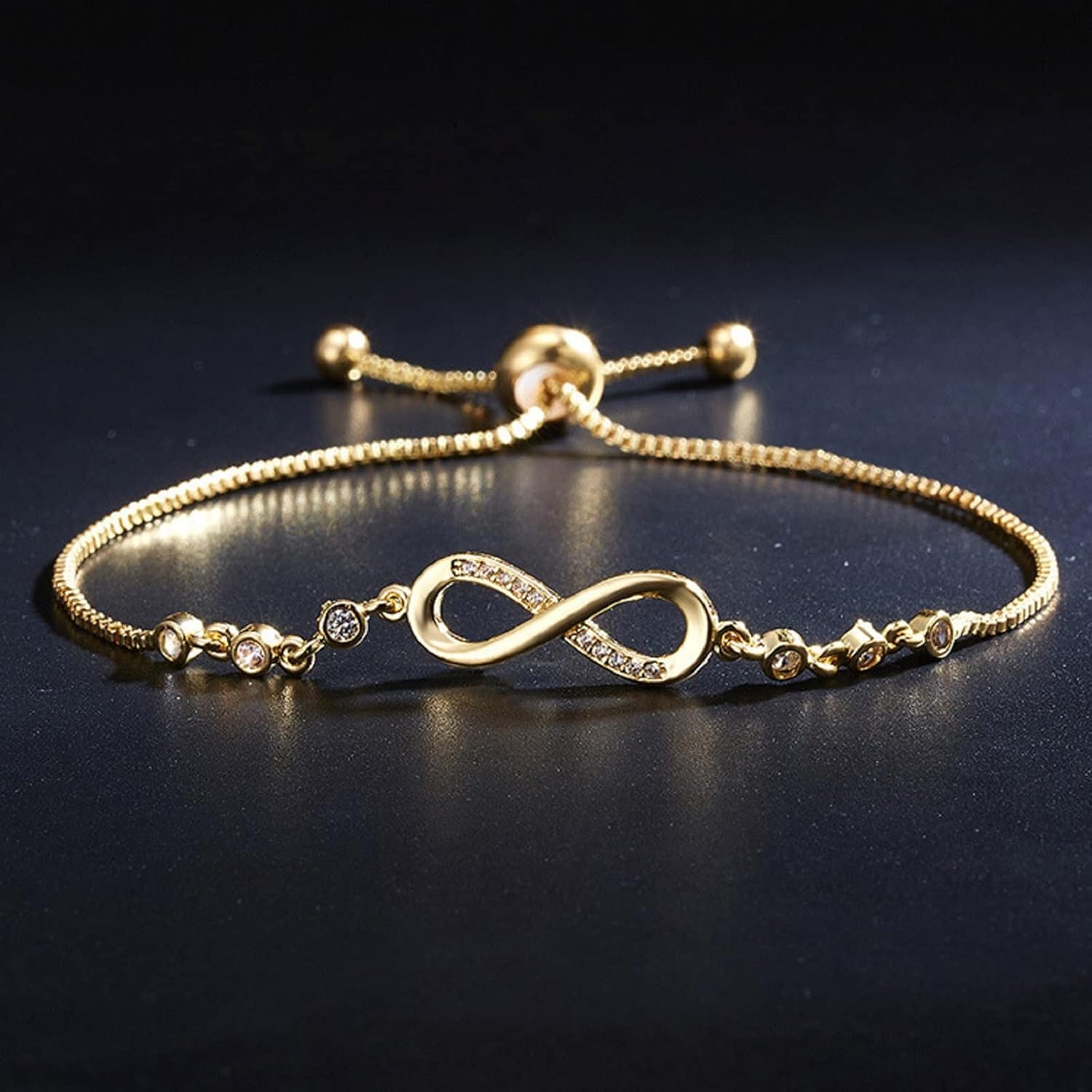 Shining Diva Fashion Latest Stylish Gold Plated Infinity Bracelet for Women & Girls (rrsd16478b)