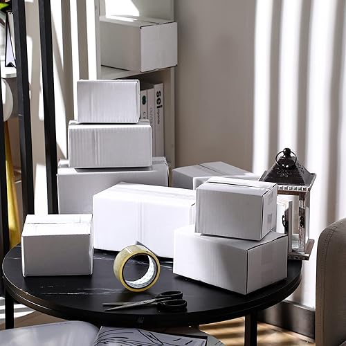 Vista 8 de Outus Paquete de 32 cajas de envío de 4 tamaños, cajas de cartón corrugado kraft para correo, caja de embalaje pequeña con cinta adhesiva para Blanco