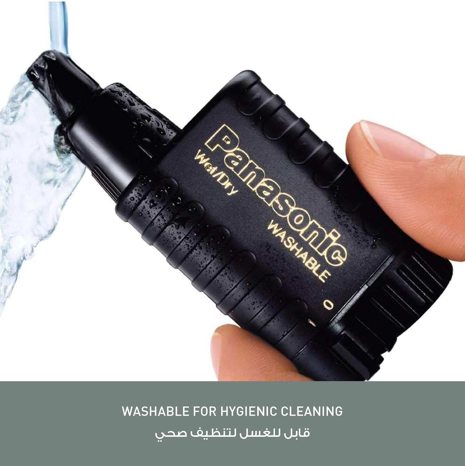 Panasonic ER115 trimmer being rinsed under running water for hygienic cleaning