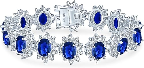 Bling Jewelry - Pulsera de tenis con circonita cúbica de zafiro de imitación y rubí (ovalada, circonita AAA, 7.5in)