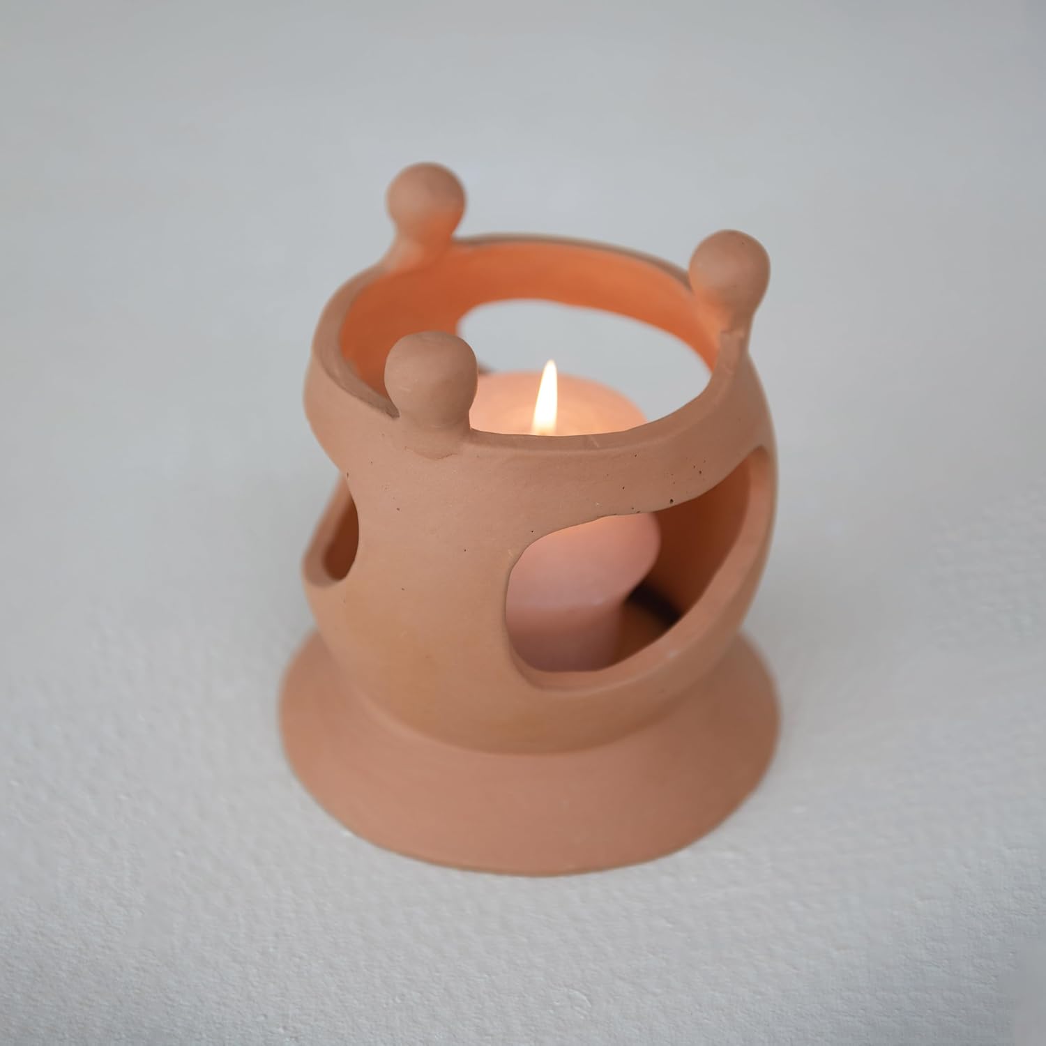 Creative Co-Op Handmade Terracotta Candle Holder with Circle of Figures