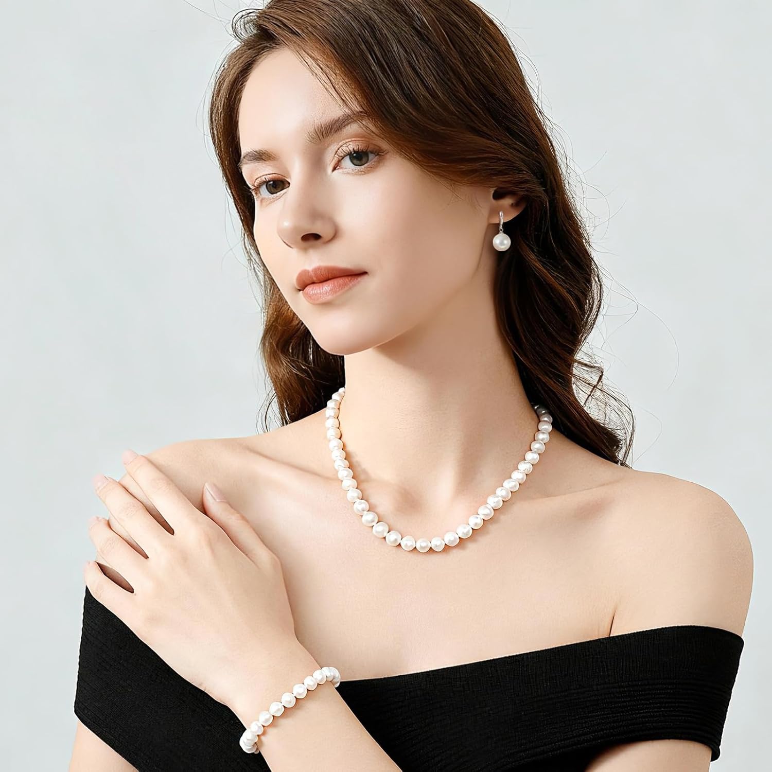 Pearl Necklace Set, featuring an exquisite bracelet, stud earrings, and necklace. This pearl necklace, bracelet, and ring ensemble radiates elegant charm, effortlessly elevating the sophistication of everyday attire. Perfect for weddings, banquets, or birthday celebrations, it also makes a thoughtful gift for women