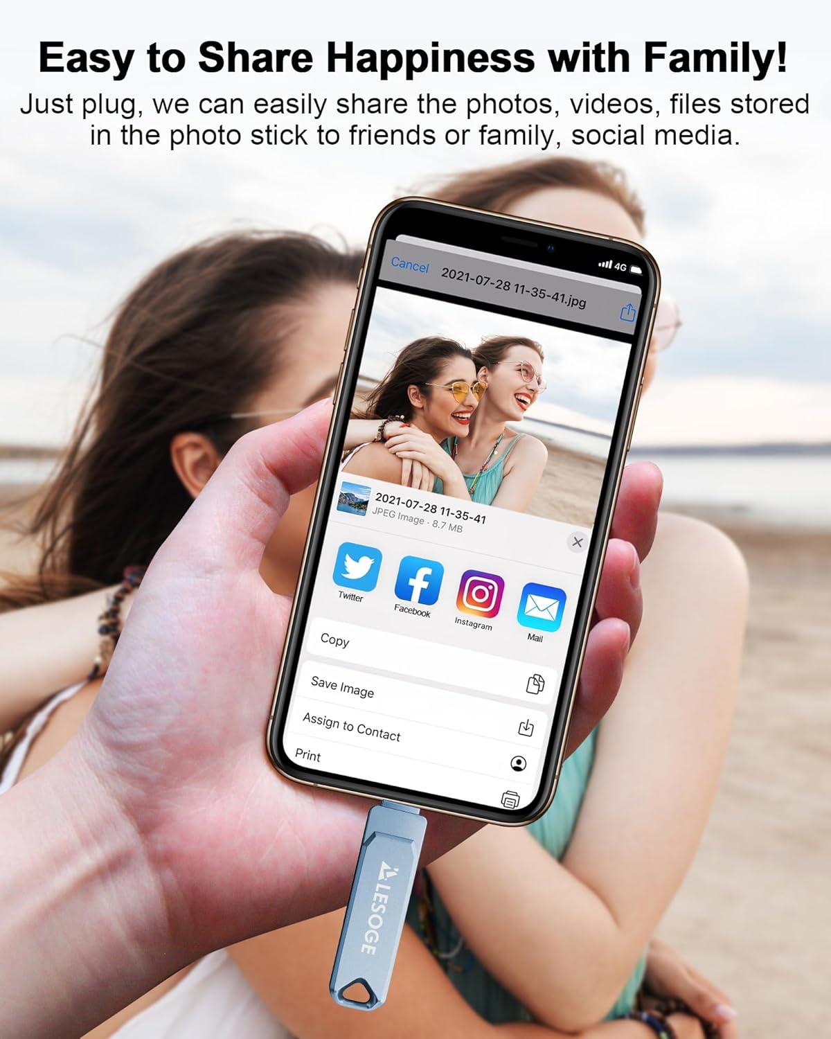 Hand holding a smartphone with the LESOGE USB Flash Drive connected, showing sharing options for a photo via social media.