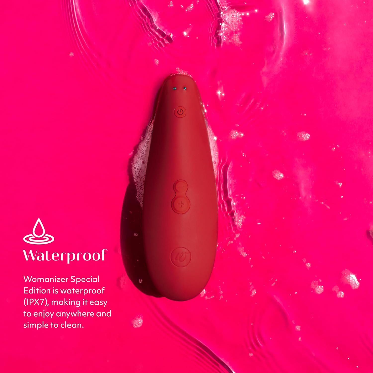 Womanizer Special Edition device submerged in water, illustrating its waterproof design