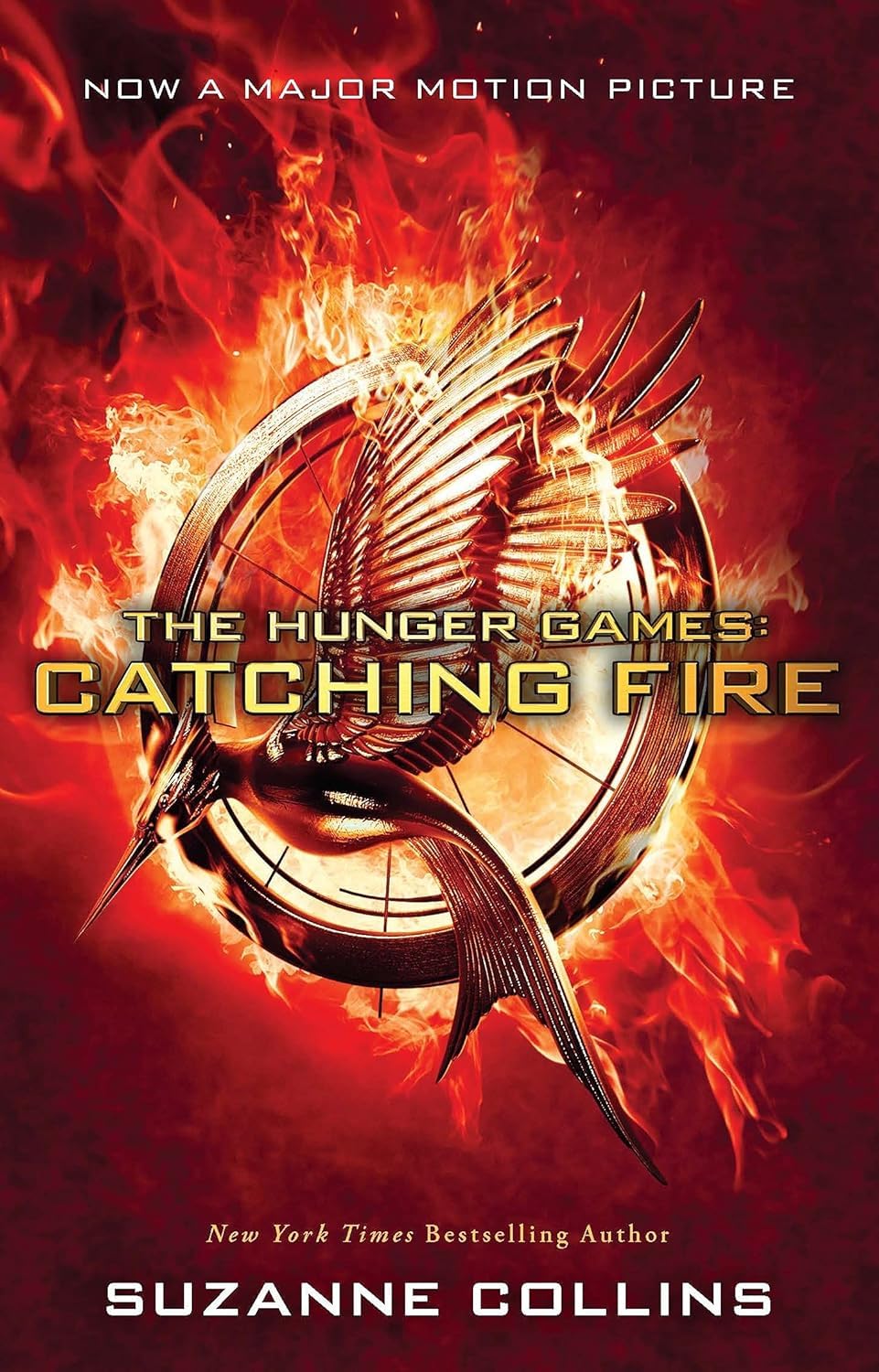 Catching Fire Movie-Tie-in-Edition [Paperback] [Nov 10, 2014] SUZANNE COLLINS Paperback – November 10, 2014