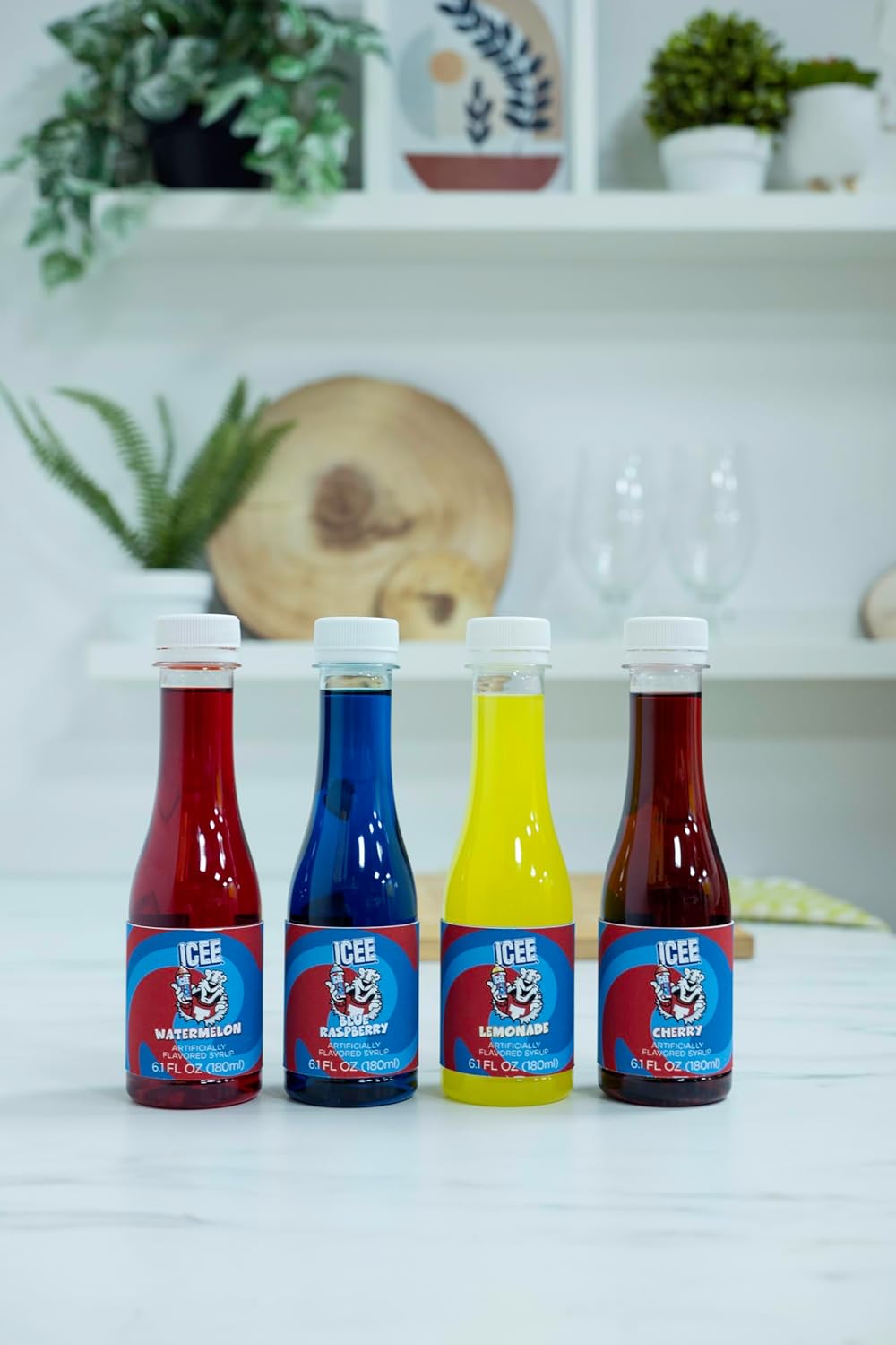 ICEE 4 Pack Slushie Syrups. Genuine ICEE Shaved Ice Snow Cone Syrup including Watermelon, Lemonade, Blue Raspberry & Cherry Flavors. 4 x 6.1floz. Perfect For Snow Cones, Slushies, Sodas & Ice Pops.