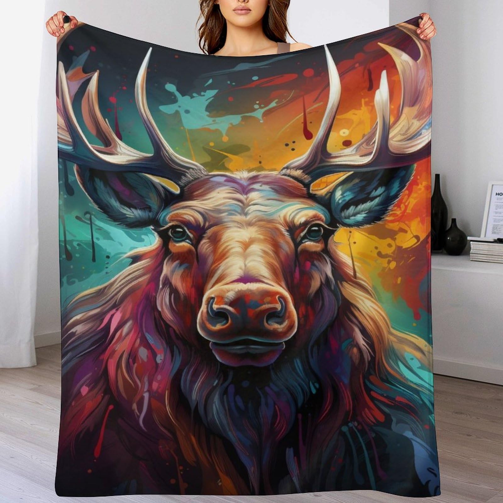 Couverture en flanelle imprimée élan pour des soirées cocooning sur le sofa