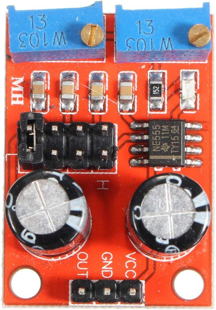 Top view of NE555 module showing VCC, GND, OUT pins and NE555 chip