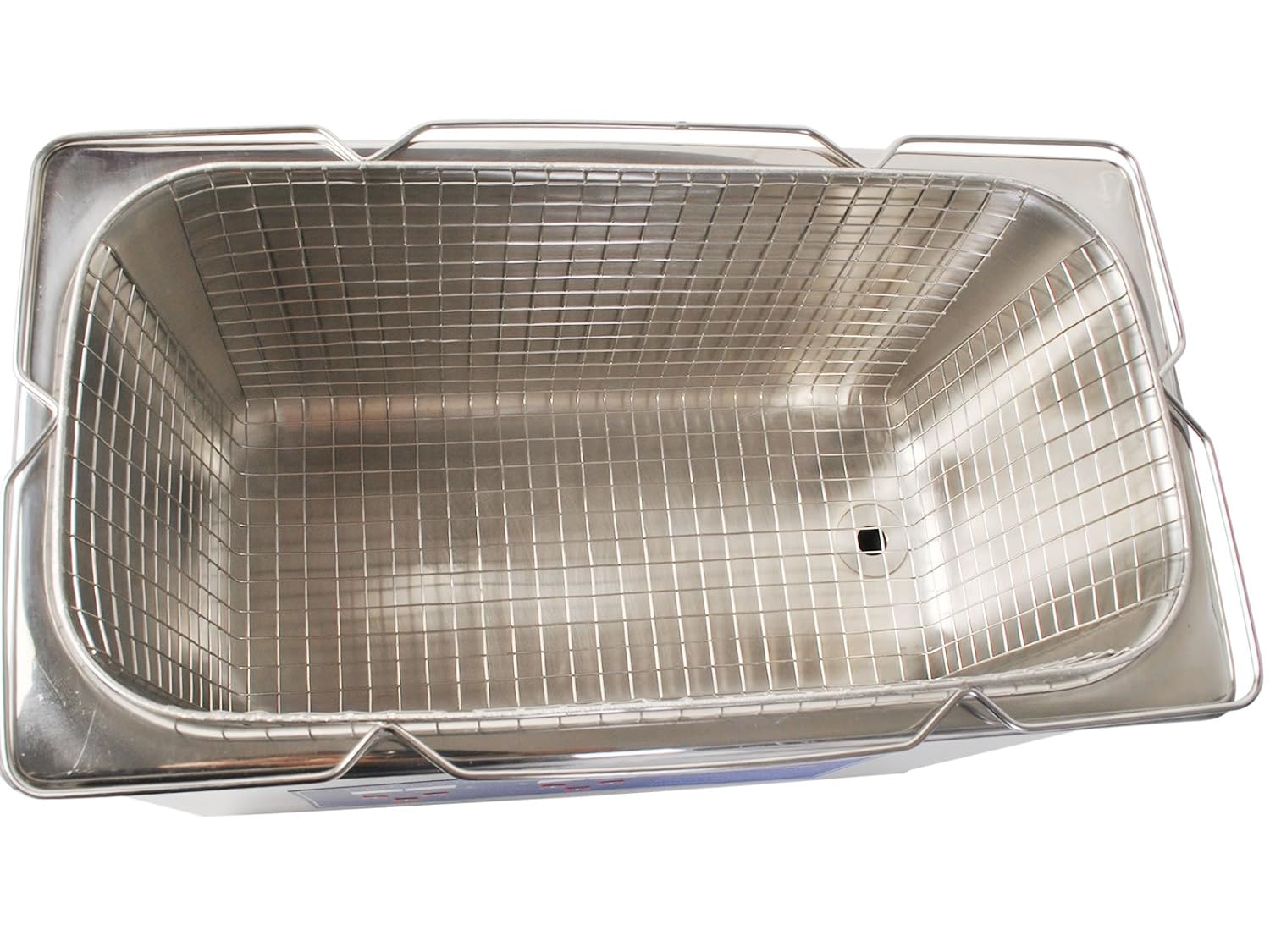 Top-down view of the NSKI JPS-30A ultrasonic cleaner's tank with the basket removed
