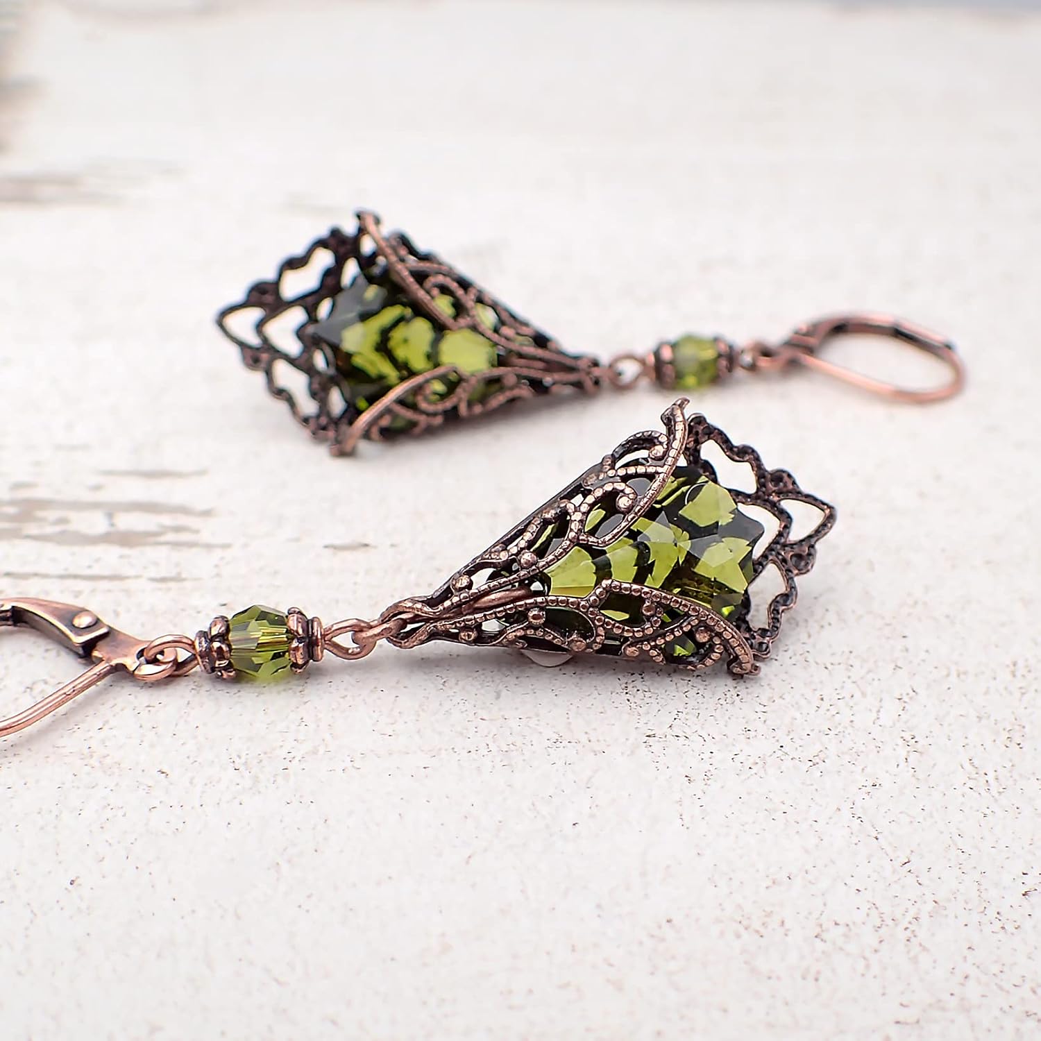 Lever Back Earrings with Olive Green Crystals and Antiqued Copper-Plated Brass Filigree