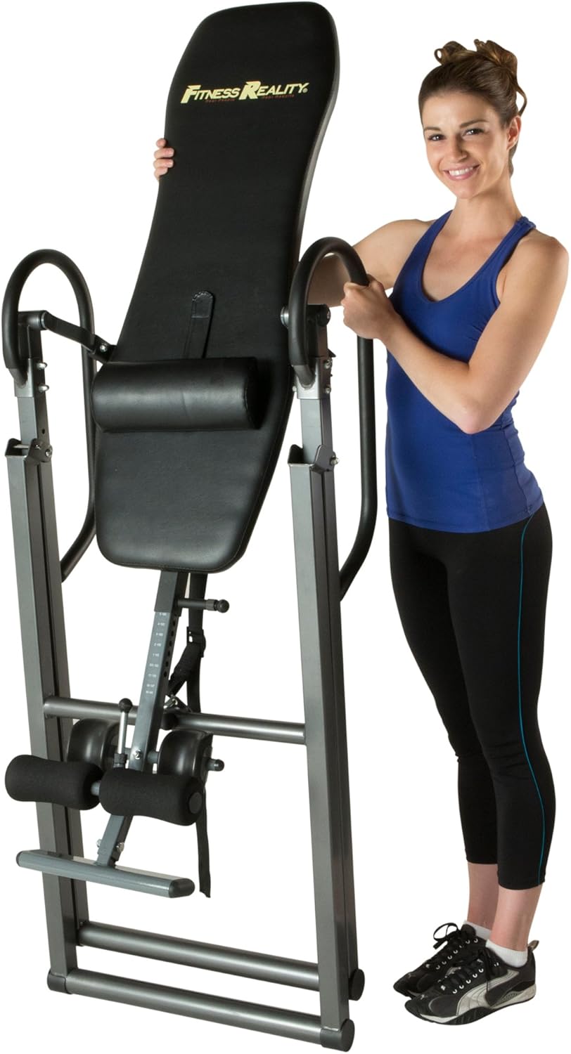 Woman standing next to the FITNESS REALITY 790XLT Inversion Table in a folded position