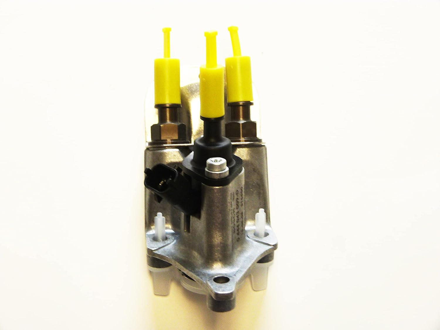 Top-down view of the Cummins 2888173 Doser Injector, showing the overall assembly and multiple connection points with yellow caps.