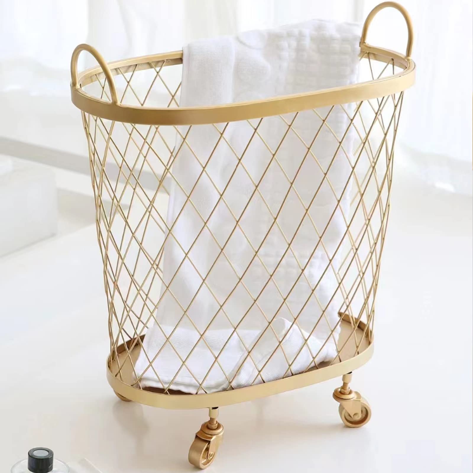 Panier à linge en métal chic noir et or pour une organisation élégante de la chambre