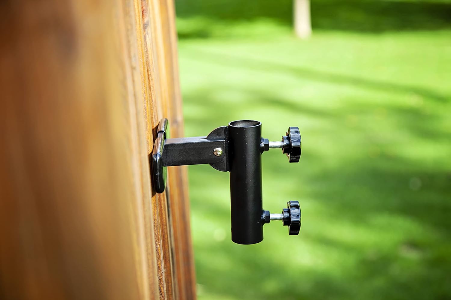 | Flagpole Accessory Holder | Attaches Directly to Patio or Deck Railing with No Tools and No Damage to Your Deck Rails | Holder Adjusts for Vertical or Angled Positions (Black)