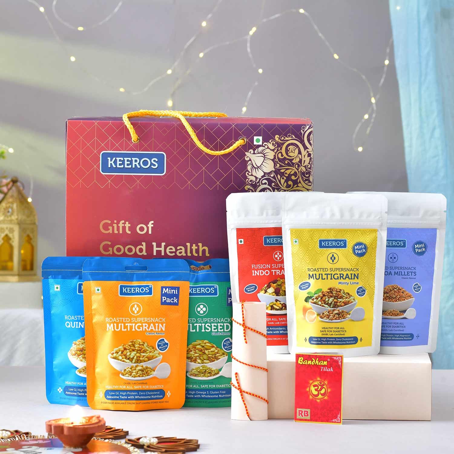 Keeros Healthy Bhai Dooj Gift Hamper for Brother with, Roli Moli Chandan Tikka Chawal Mishri | Combo of Sweet & Salted, Crispy & Tasty SuperSnacks in a Premium Gift Box|