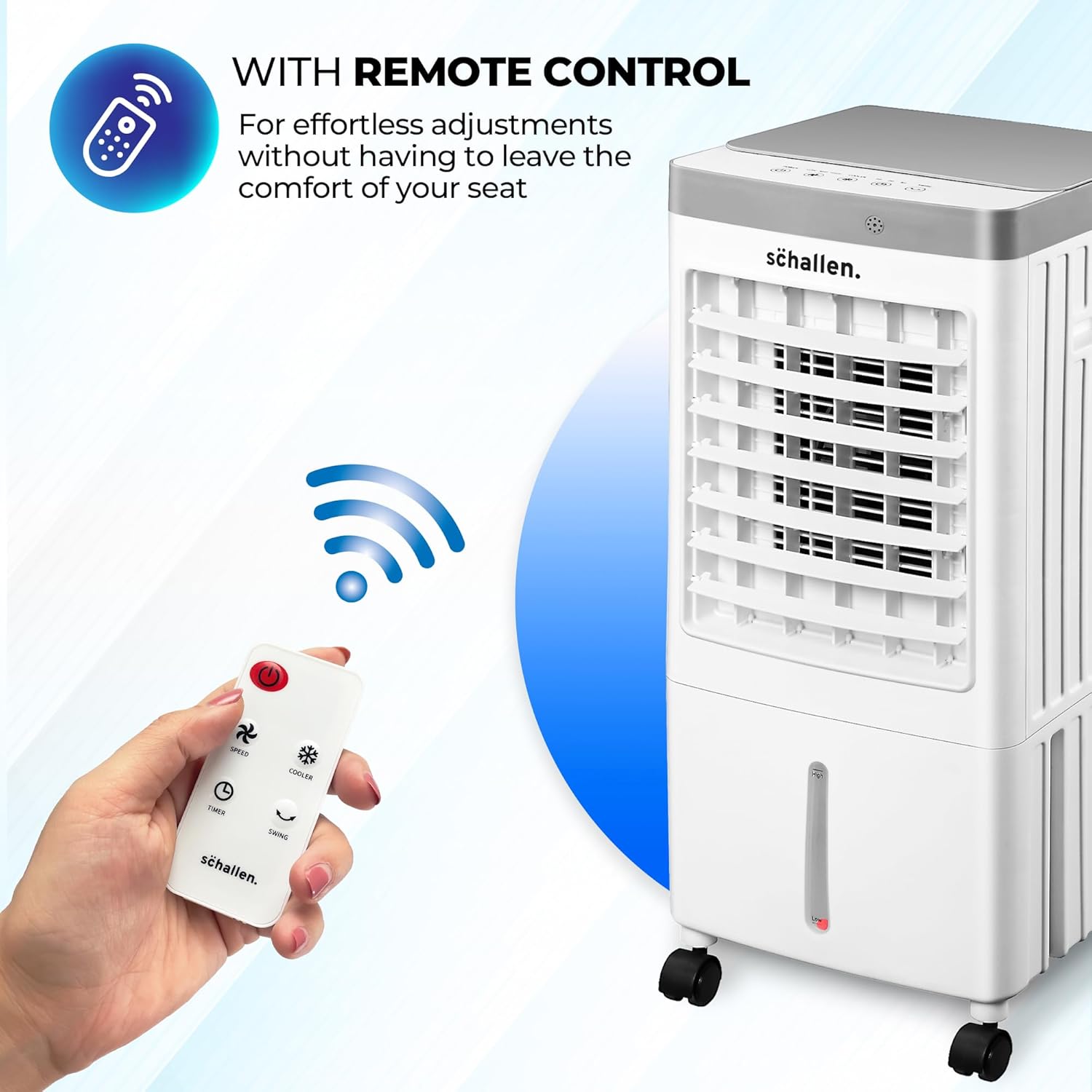 Hand holding the remote control for the Schallen Portable Air Cooler, with the cooler in the background.