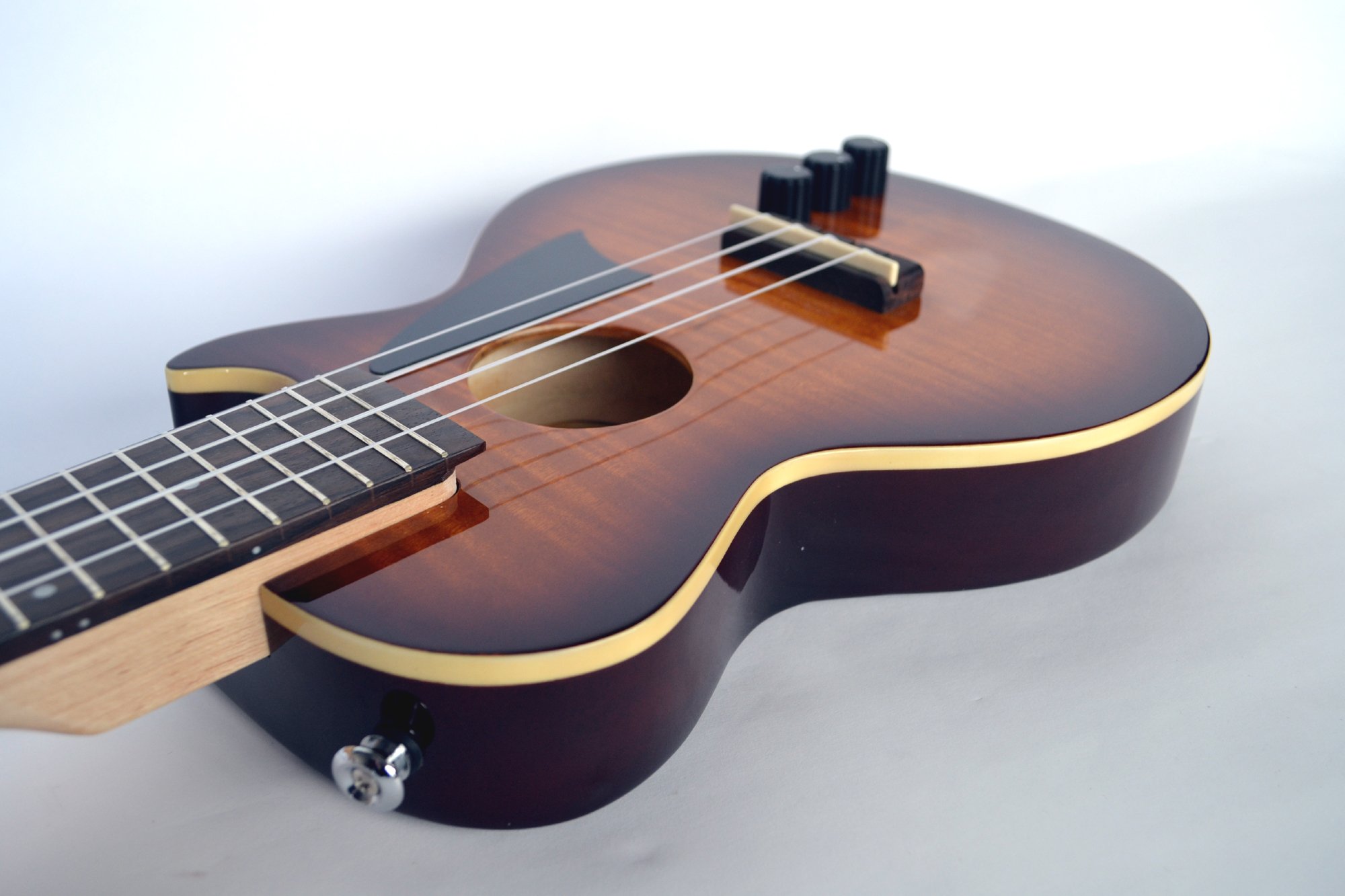 Ukulele Slimline Electric Tenor Powered pickups Flame Maple finish Nylon strings by Clearwater