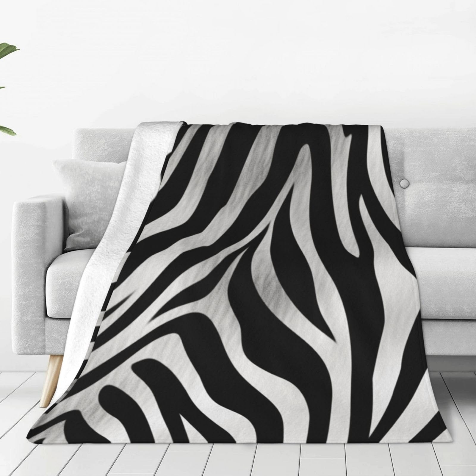 Couverture lit flanelle zèbre pour soirées cocooning canapé et nuits camping