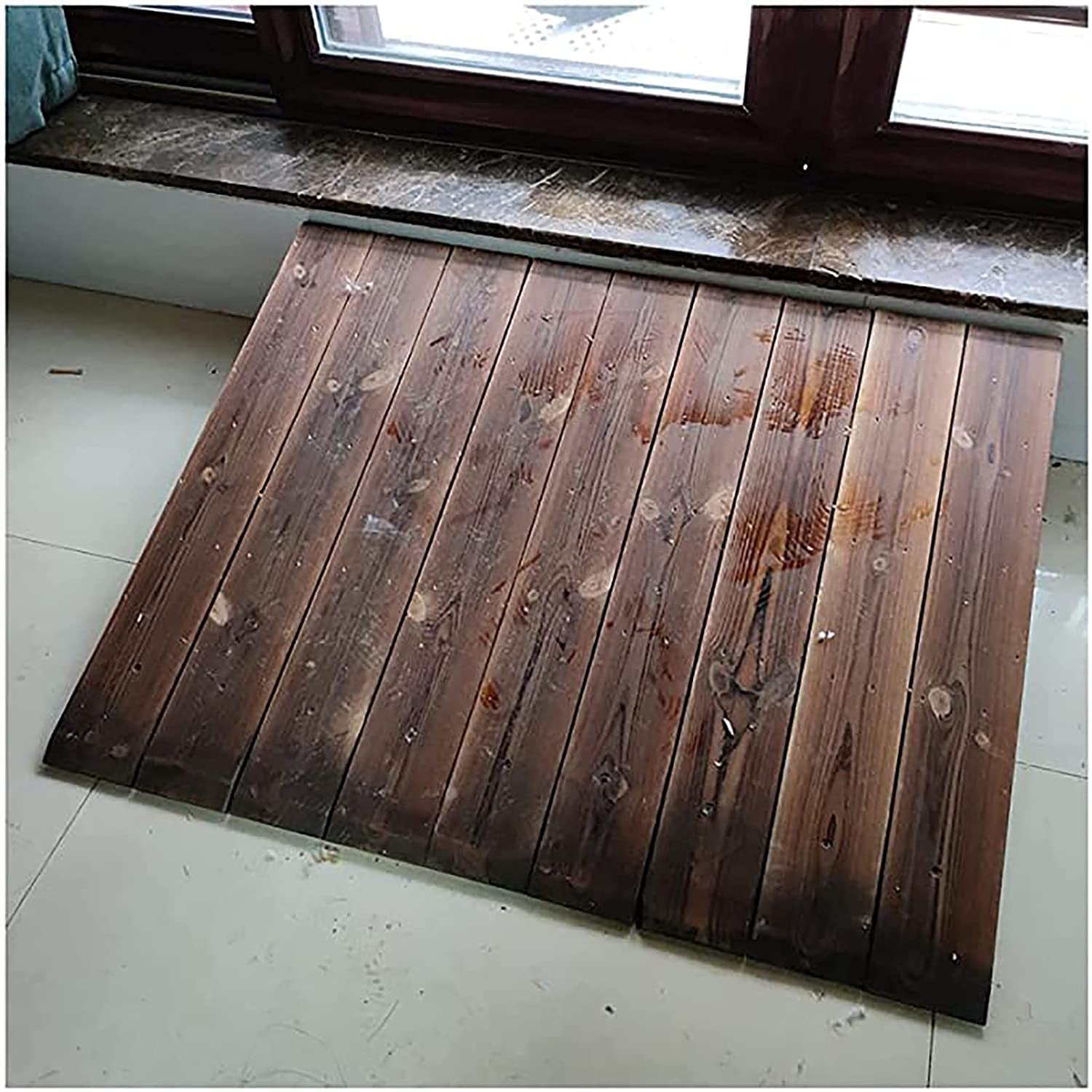 Rampe pour fauteuil roulant en bois pour franchir les marches de maison