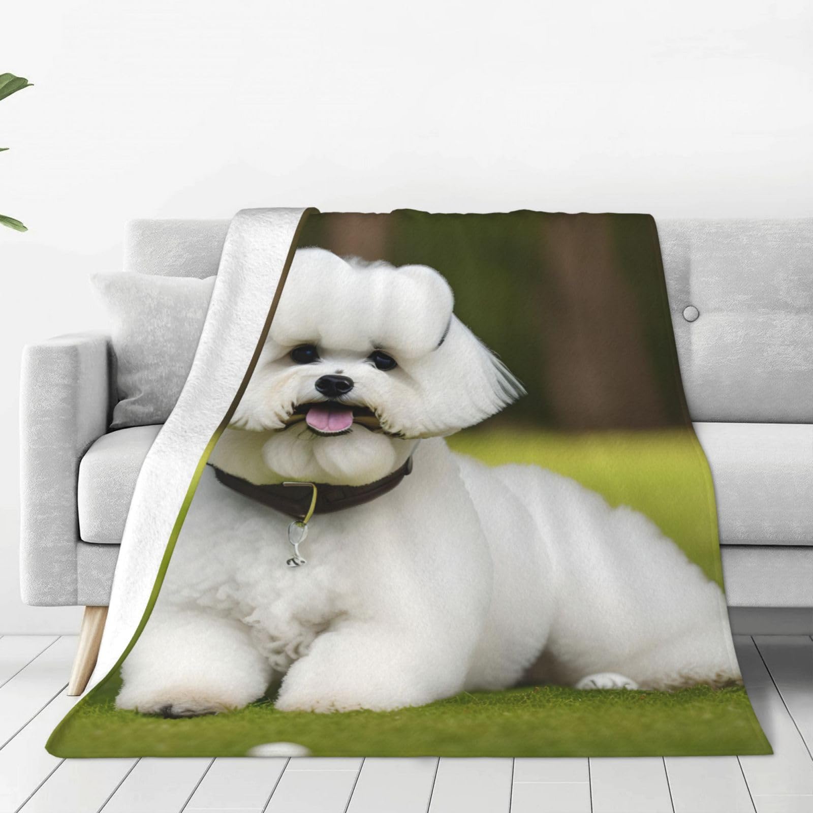 Couverture polaire chaude bichon frisé contre le froid du lit