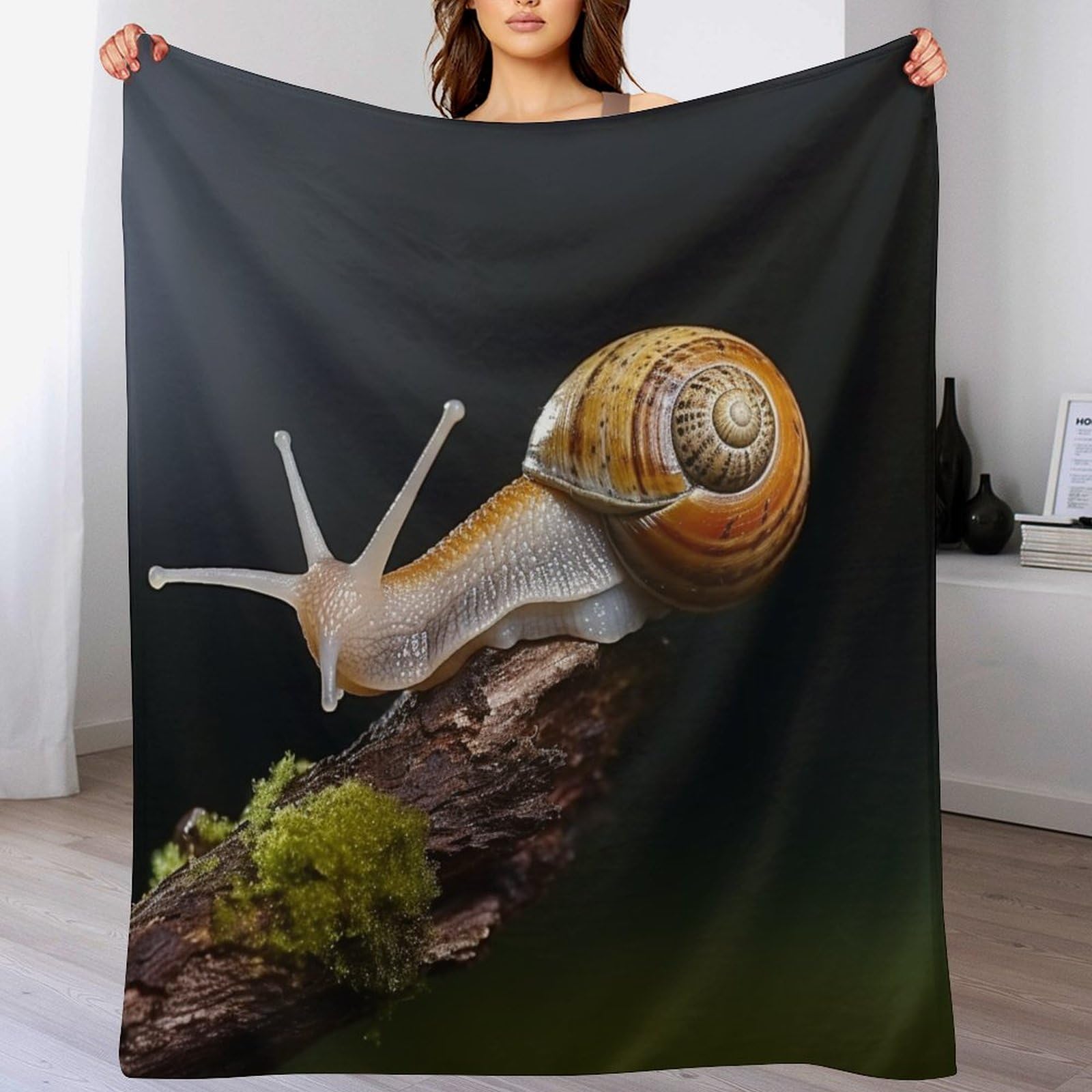 Couverture moelleuse avec motif de escargots pour des moments cocooning doux