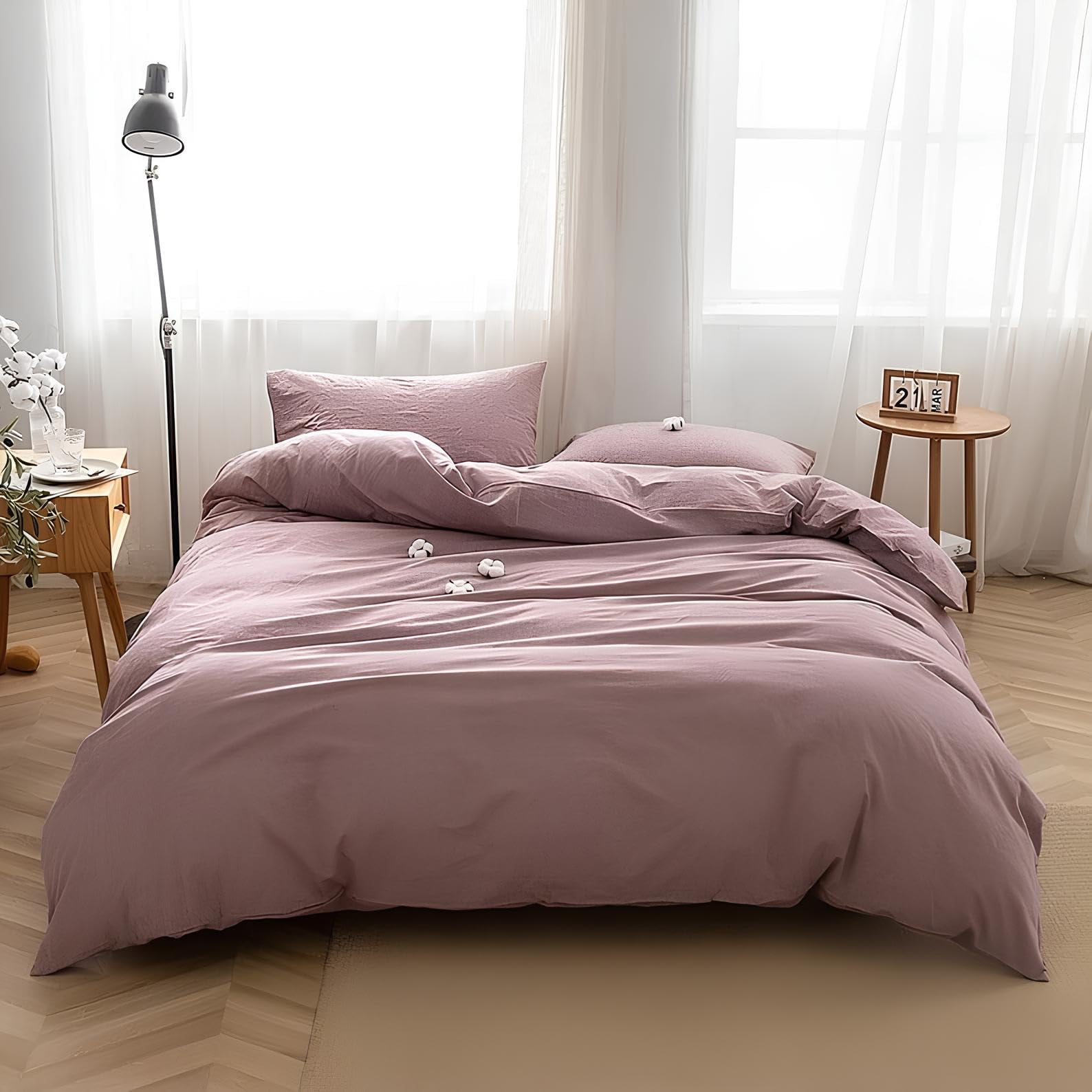 Funda nórdica rosa gris para un dormitorio de matrimonio acogedor y moderno