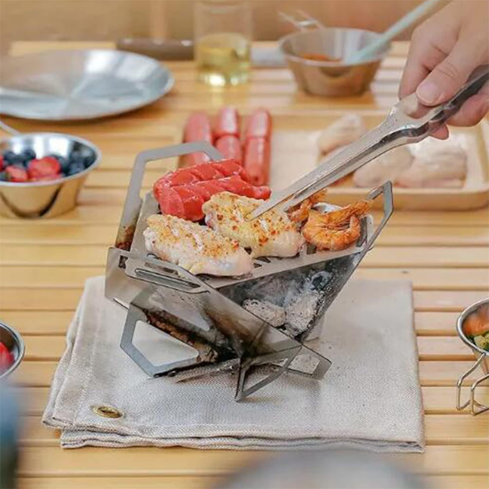 Estufa plegable de camping | Parrilla portátil de acero inoxidable para madera y carbón | Barbacoa compacta con bolsa de almacenamiento para mochileros, senderismo, viajes