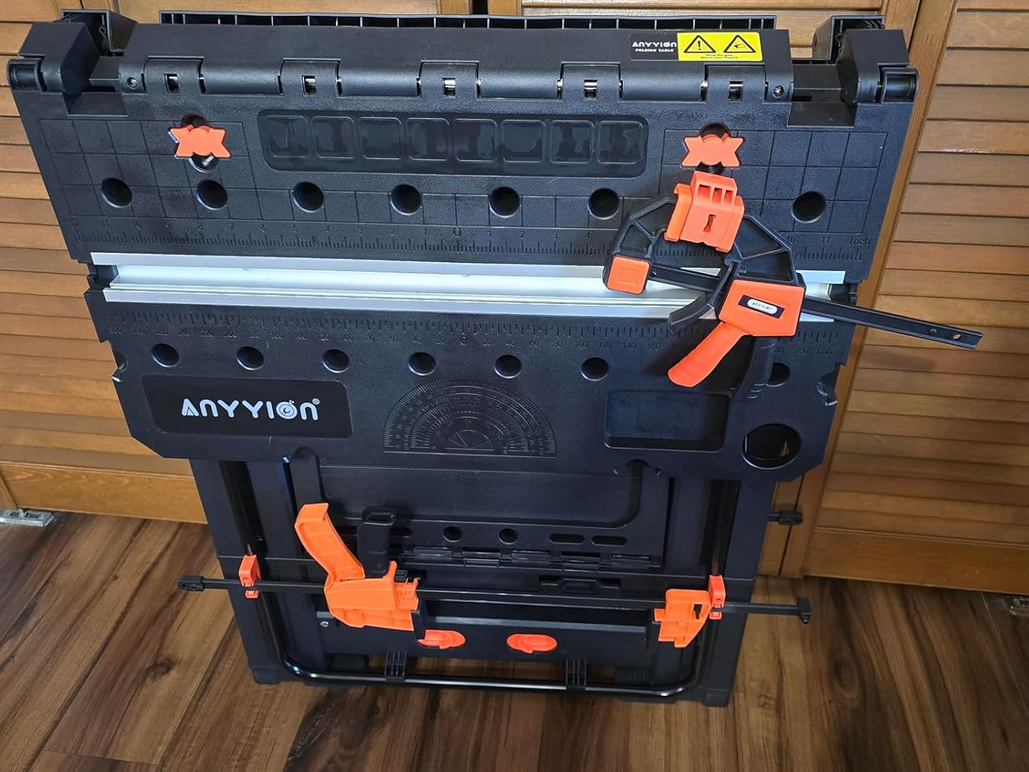 Anyyion Work Bench,2-in-1 Folding Work Table and Sawhorse, 31" W x 25" D x 28”-31" H,Easy Setup Portable Workbench, 4pcs Clamps, 2pcs Bench Dogs