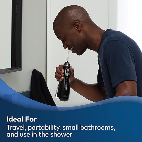 Miniatura 23 de Waterpik El irrigador dental acuario + puntas de reemplazo de prótesis de implantes - El sistema eléctrico de higiene dental elimina hasta el 99.9%