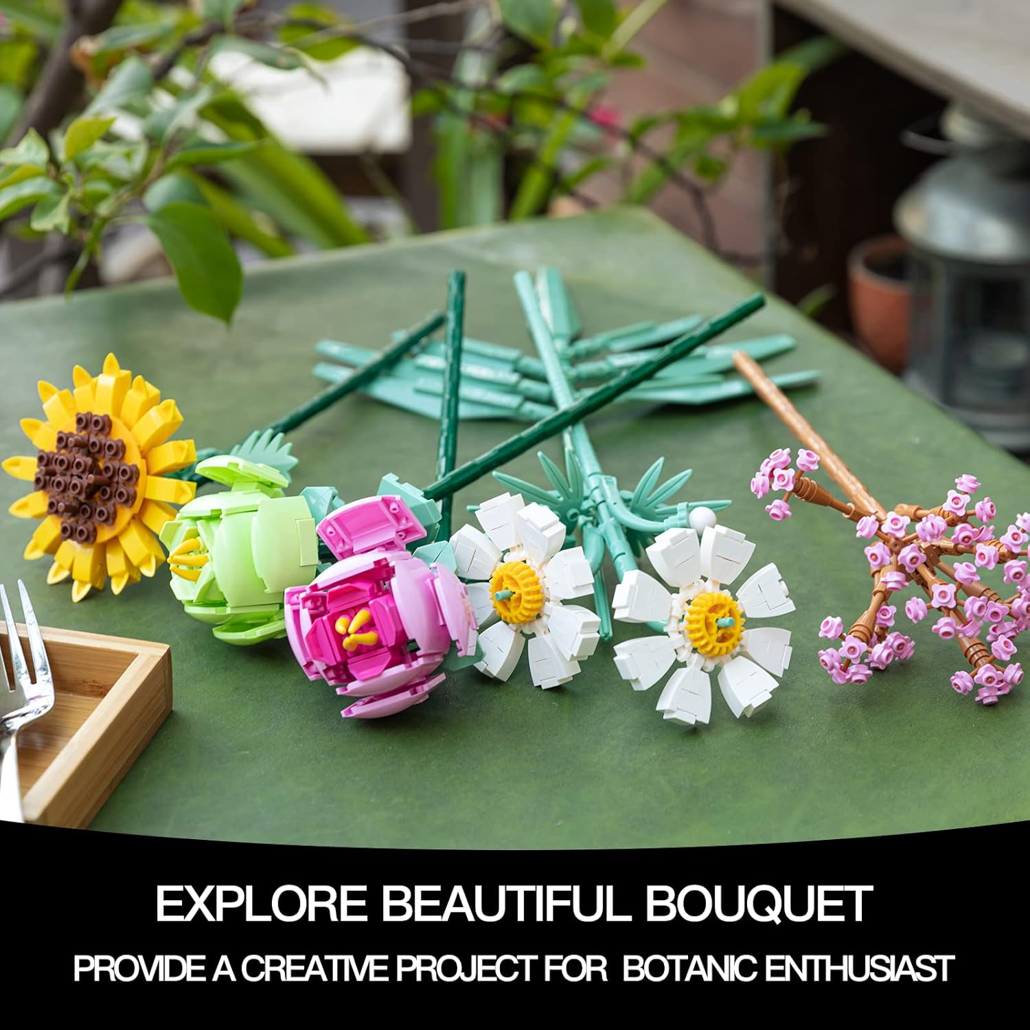 Individual flower components and stems laid out on a green surface