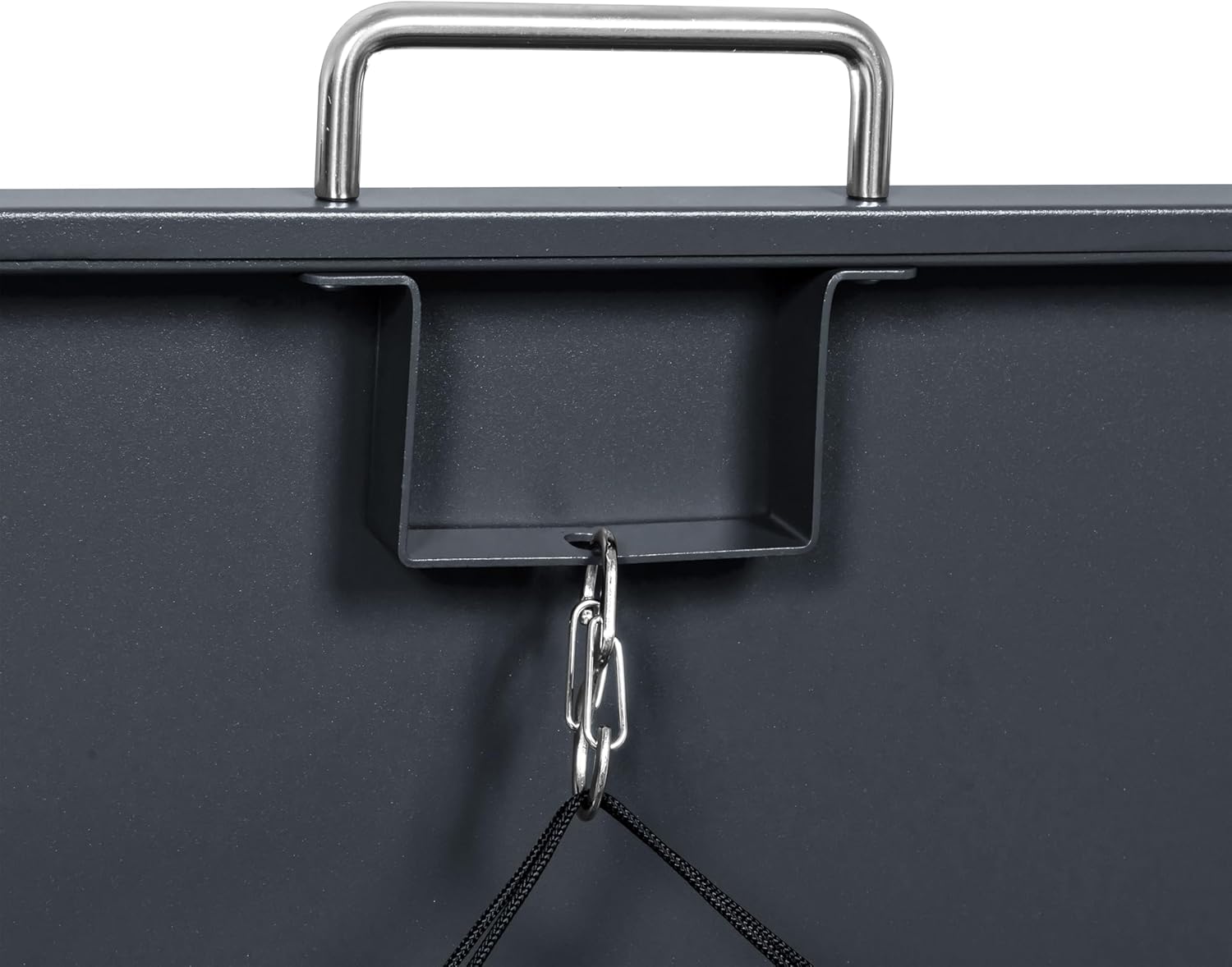 Close-up of the chain mechanism connecting the enclosure lid to a waste bin lid