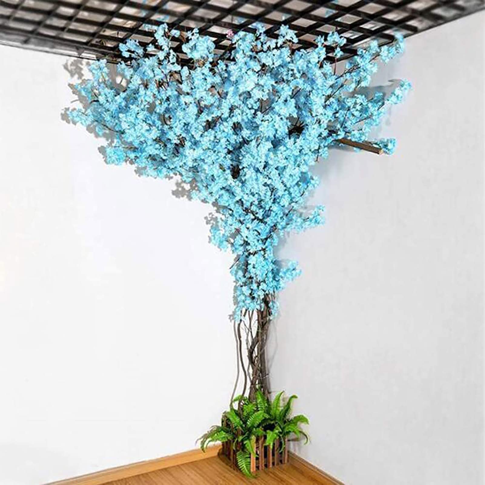 Arbre artificiel cerisier bleu réaliste pour habiller un grand mur intérieur