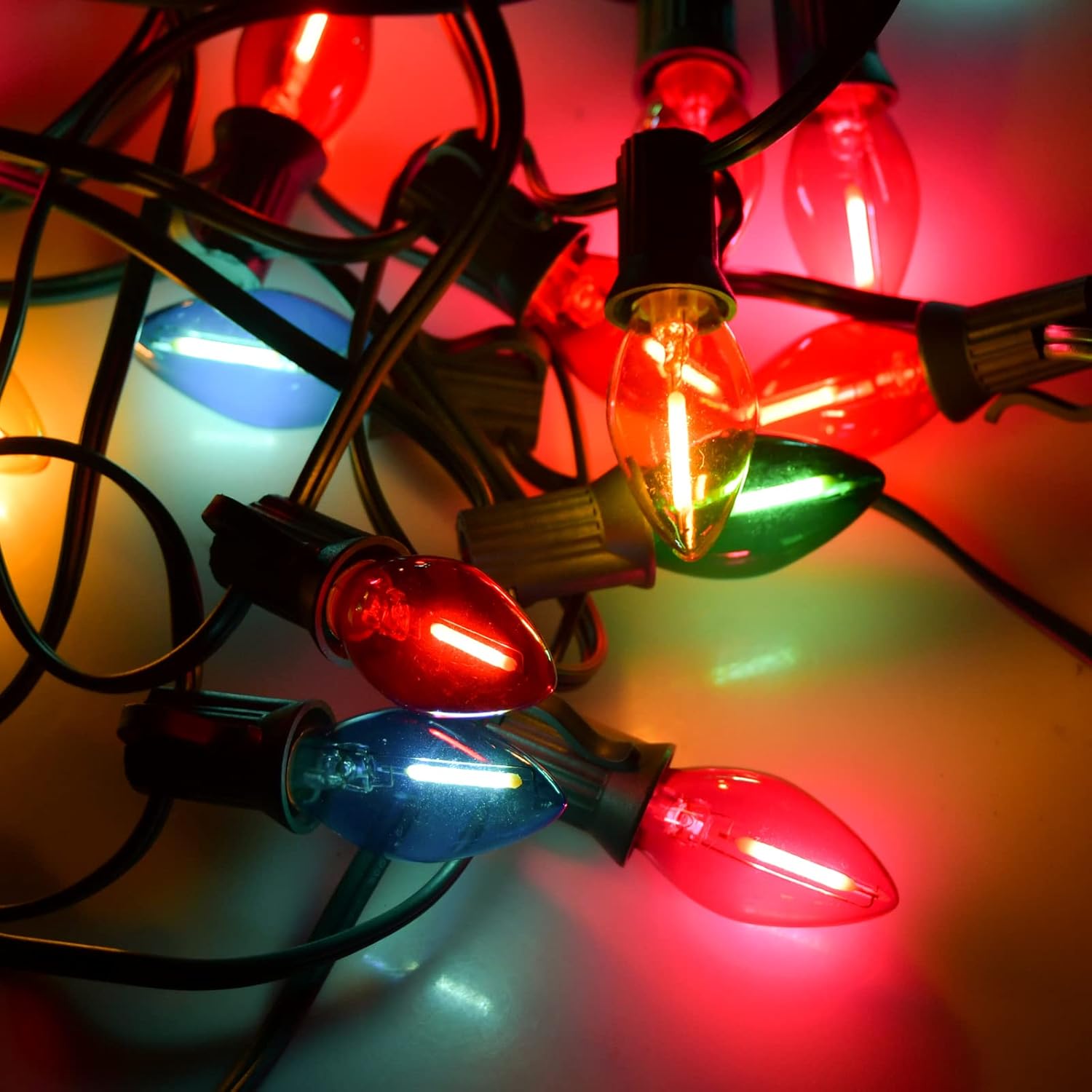 SUNSGNE 25 Feet Multicolor Christmas Lights, C7 LED Outdoor Vintage Christmas Lights with 27 LED Clear Colored Bulbs(2 Spare) for Patio Porch Roofline Decorations- Green Wire