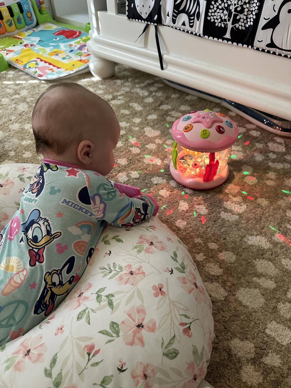 Genuine customer child enjoying screen-free play with LumaNest