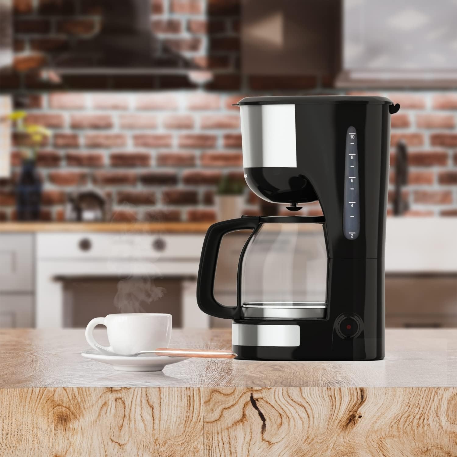 Thomson coffee machine brewing in a kitchen setting