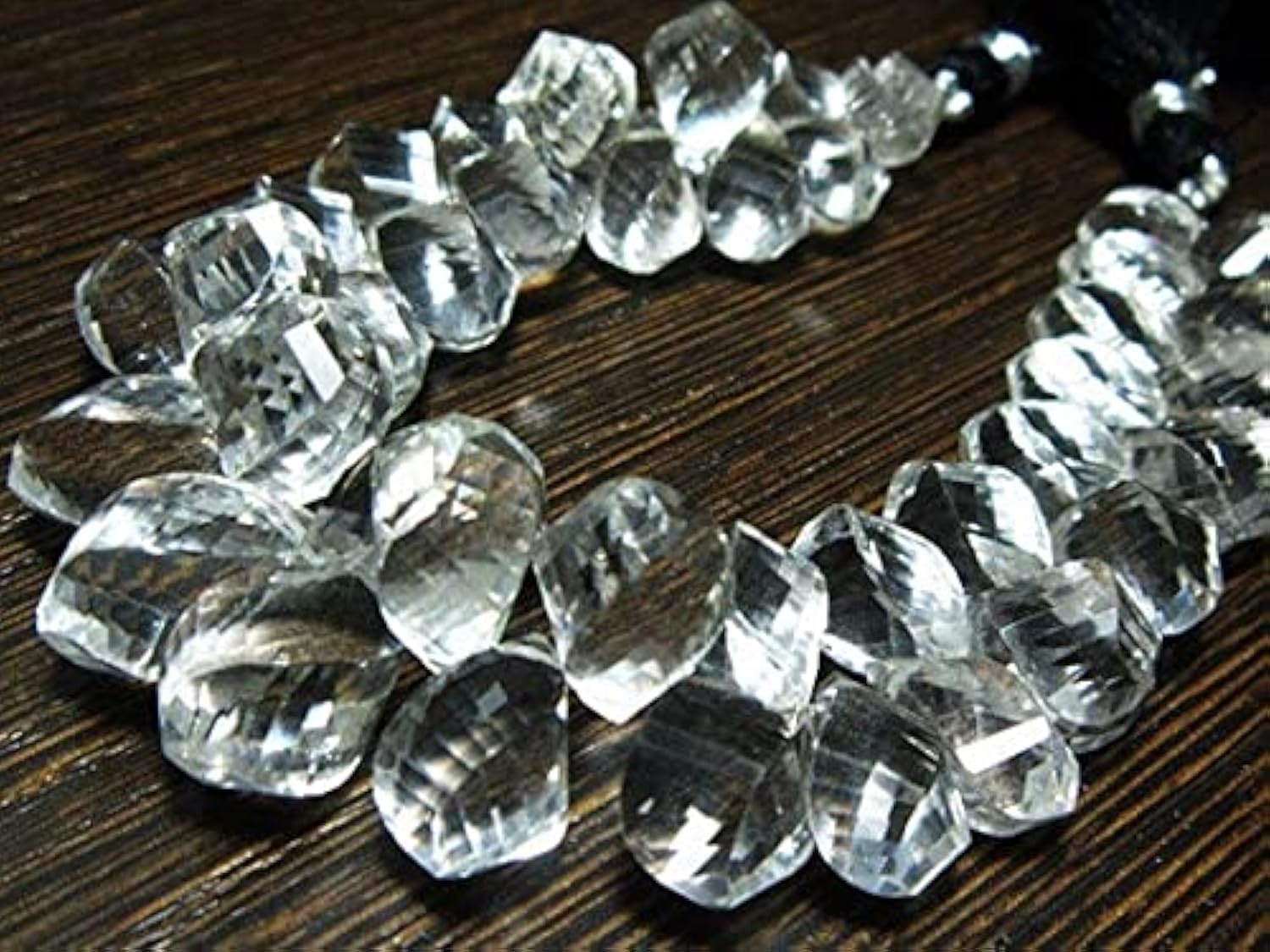Fil de cristal de roche naturel sans imperfections pour assembler des colliers durables