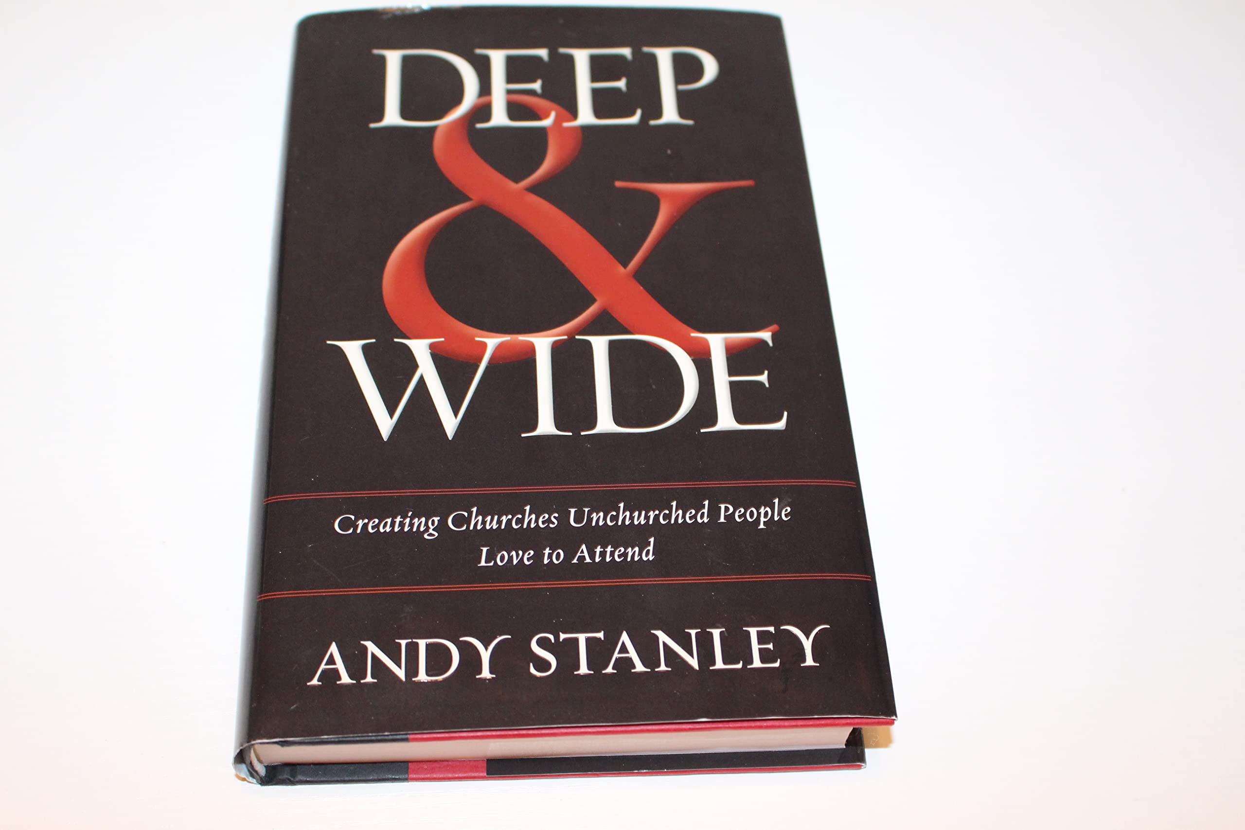Cover of Deep and Wide: Creating Churches Unchurched People Love to Attend