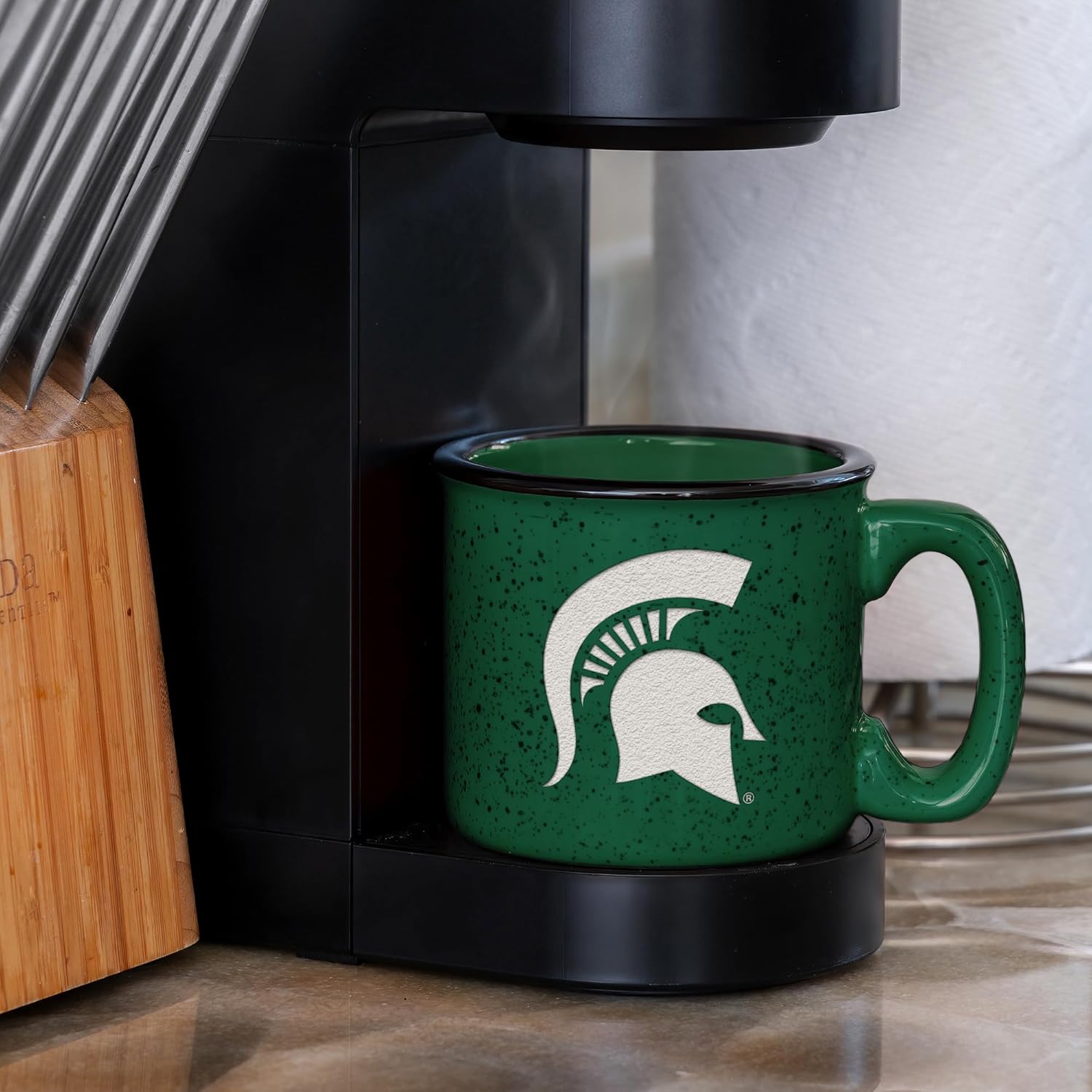 Rico Industries NCAA Michigan State Spartans Personalized 12oz. Speckle Camper Coffee Mug, Deep Laser Engraved Logo, Ceramic Camping Mug with Green Body, Speckle Glaze