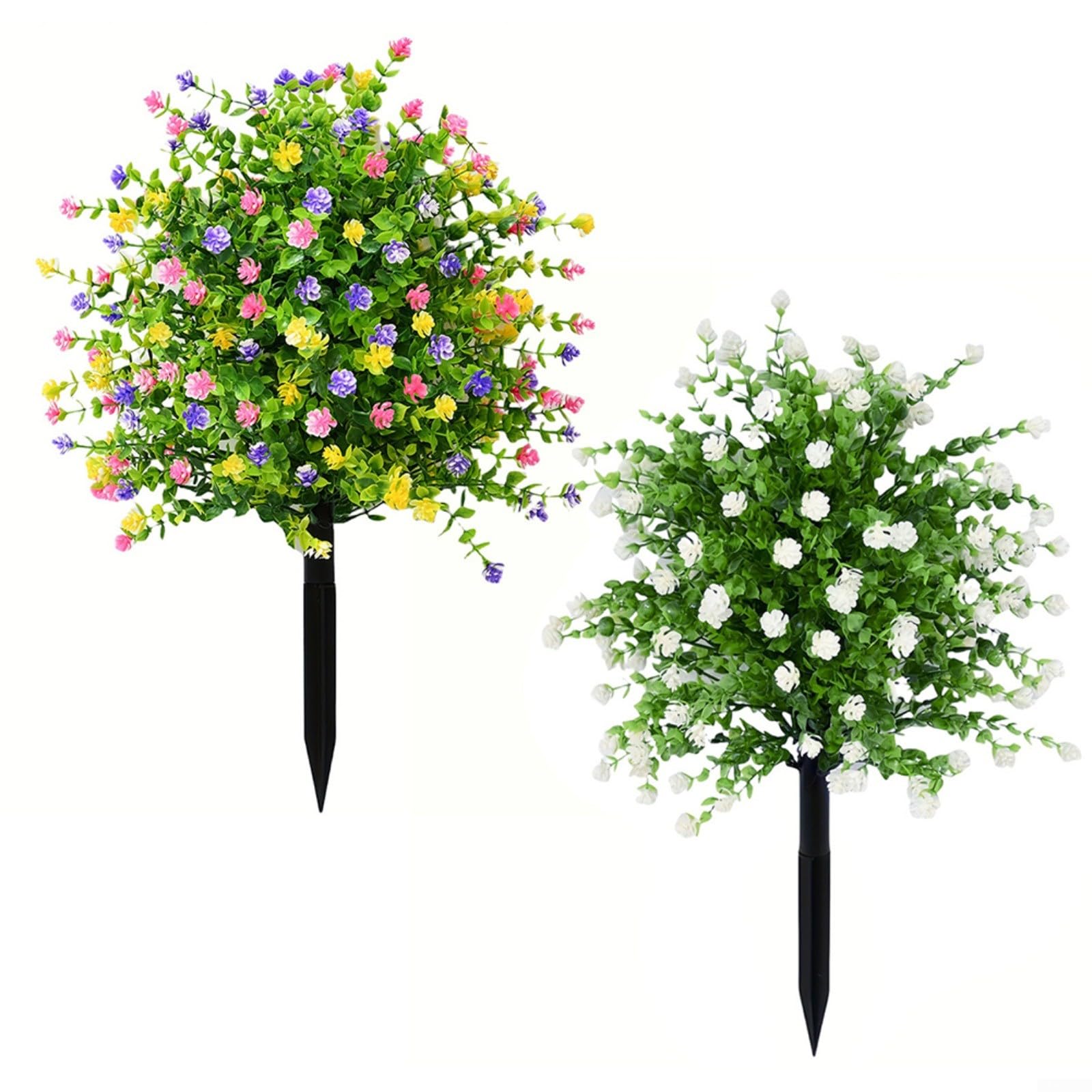 Planta artificial decorativa con flores de colores en maceta