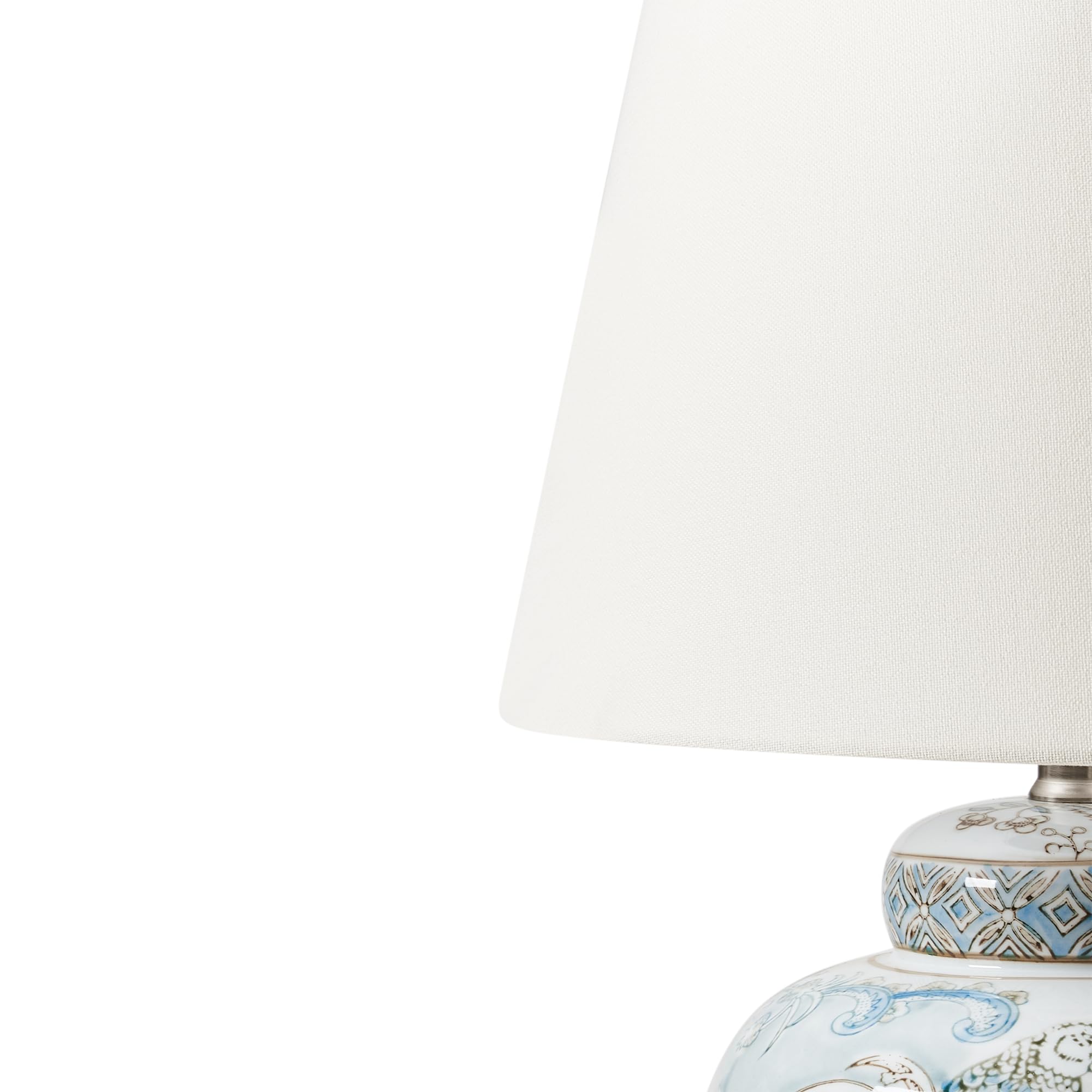 Beliani Lámpara de mesa elegante con base de porcelana con estampado pantalla de lino tambor iluminación blanco y azul Jamapa